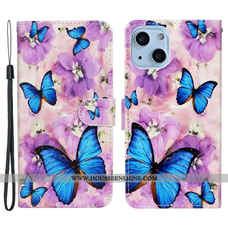 Housse iPhone 13 Mini Papillons Bleus dans les Fleurs