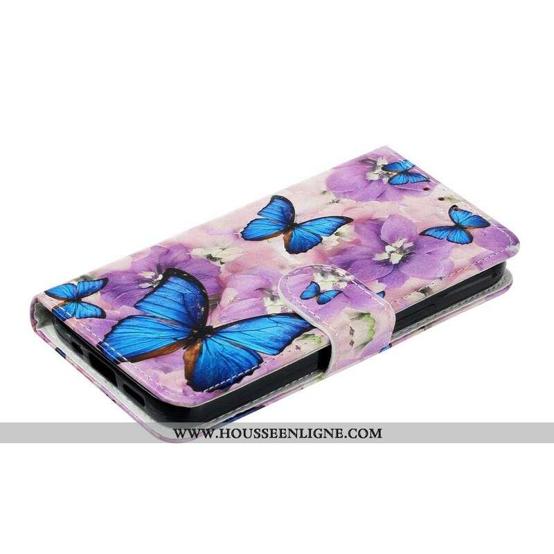 Housse iPhone 13 Mini Papillons Bleus dans les Fleurs