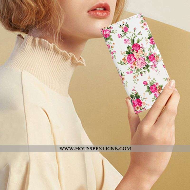 Housse iPhone 15 Plus Des Fleurs à Lanière