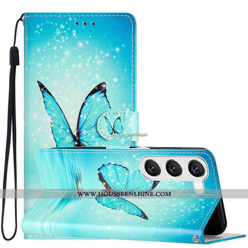 Housse Samsung Galaxy S24 5G Papillons Bleus à Lanière