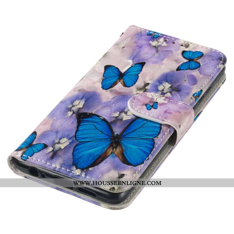 Housse Samsung Galaxy S24 FE Fleurs Violettes et Papillons Bleus