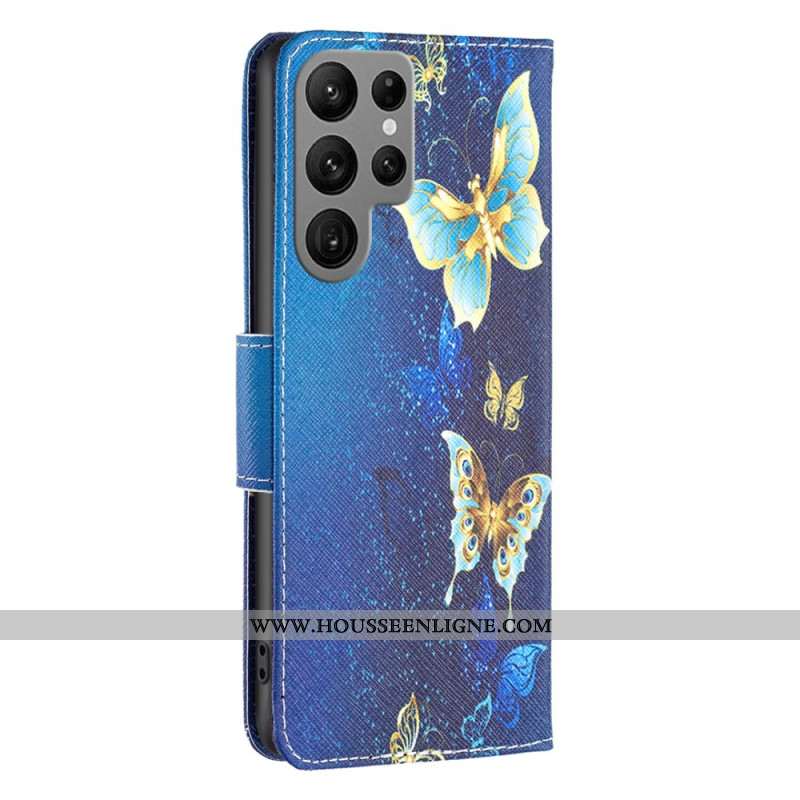 Housse Samsung Galaxy S24 Ultra 5G Papillons Dorés sur Fond Bleu