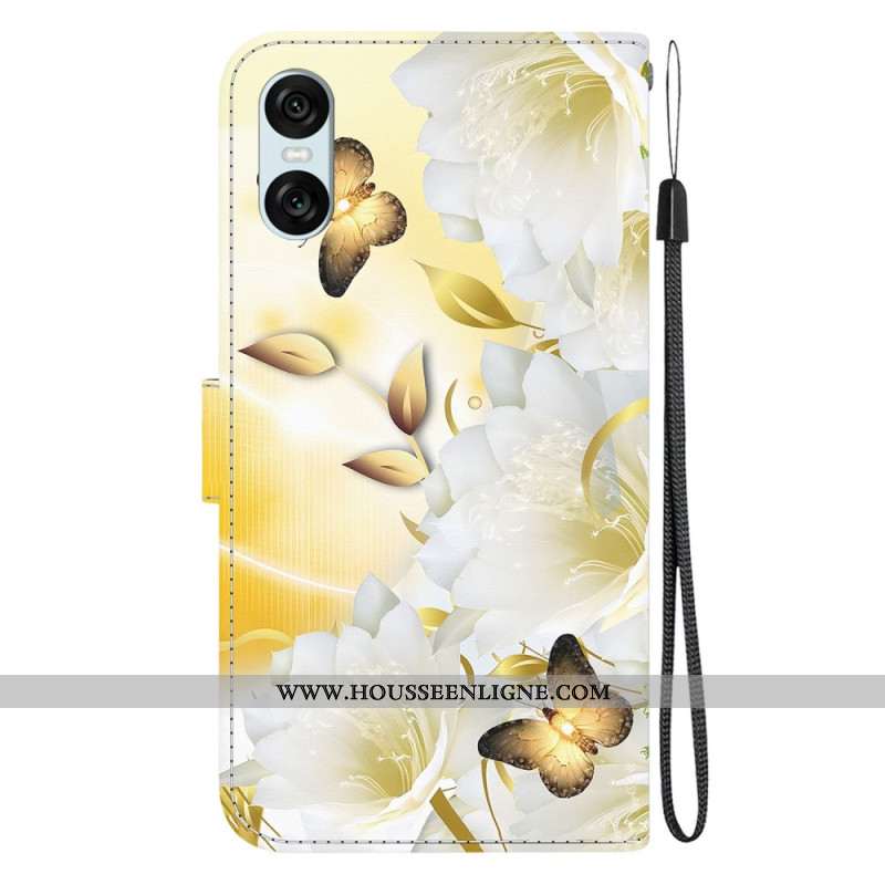 Housse Sony Xperia 10 VI Papillons Dorés et Fleurs Blanches à Lanière