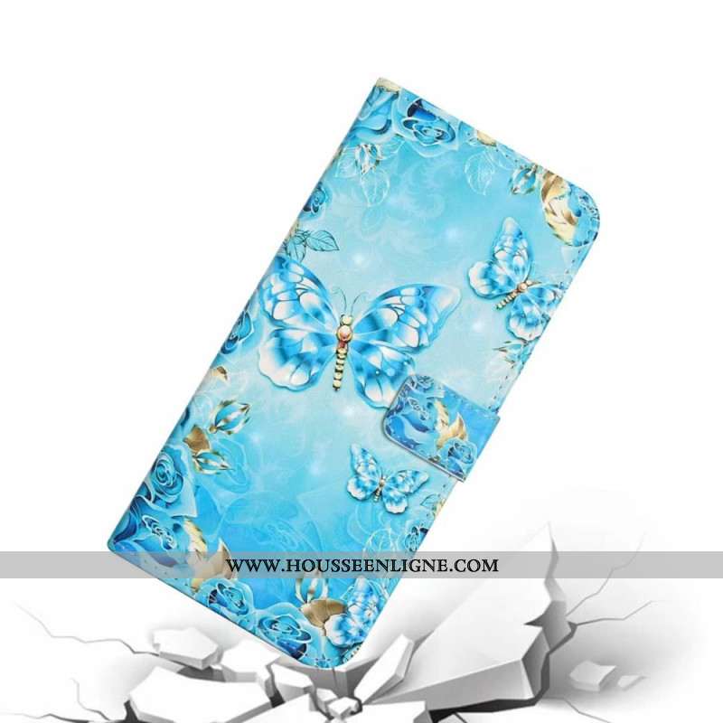 Housse iPhone 16 Papillons Bleus Clairs