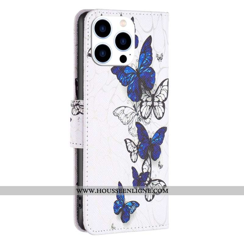 Housse iPhone 16 Pro Impression Papillons Bleus