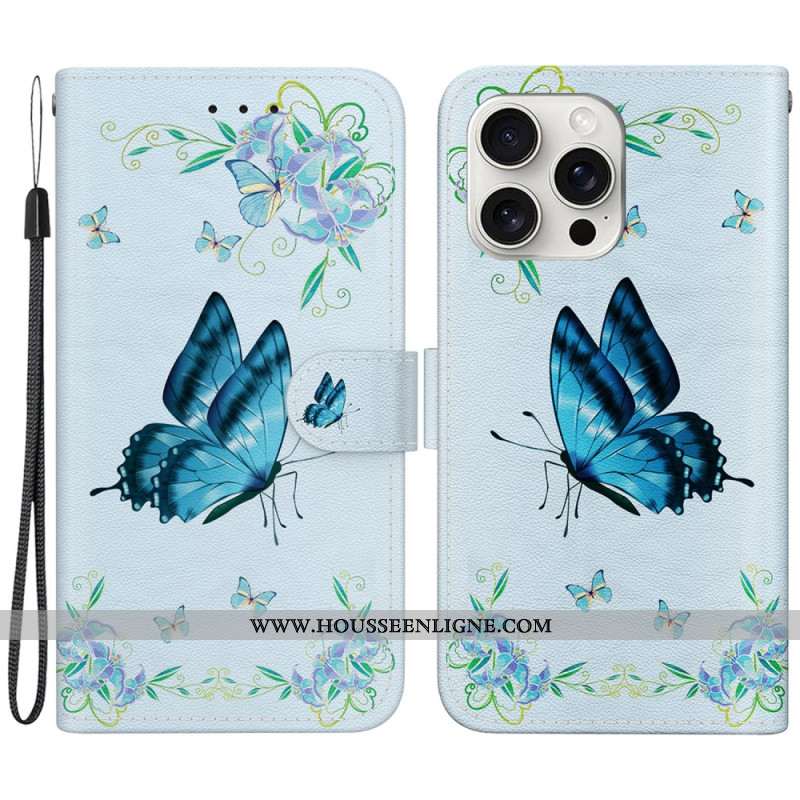 Housse iPhone 16 Pro Max Papillon Bleu et Fleurs à Lanière