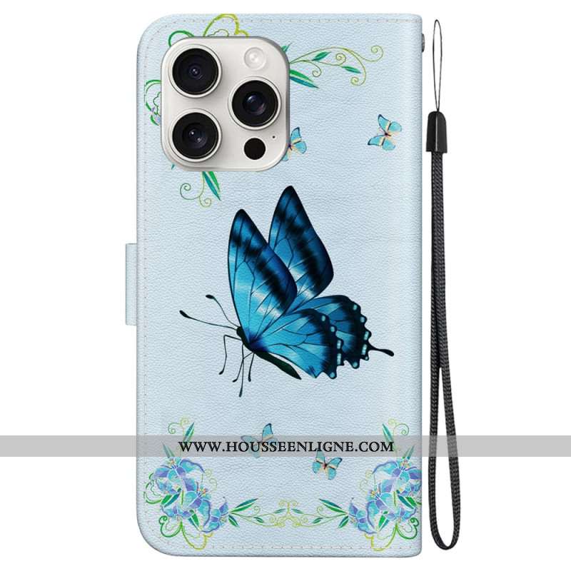 Housse iPhone 16 Pro Max Papillon Bleu et Fleurs à Lanière