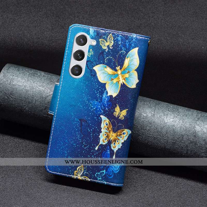 Housse pour Samsung Galaxy S24 5G Portefeuille Papillons Dorés à Lanière